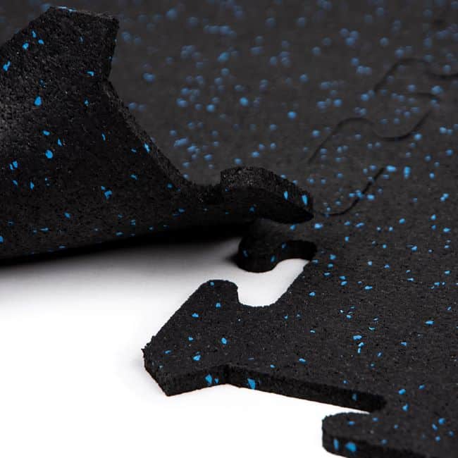 Interlocking gym tile in black with blue speckles, 50x50 cm rubber flooring for light and medium gym zones.
